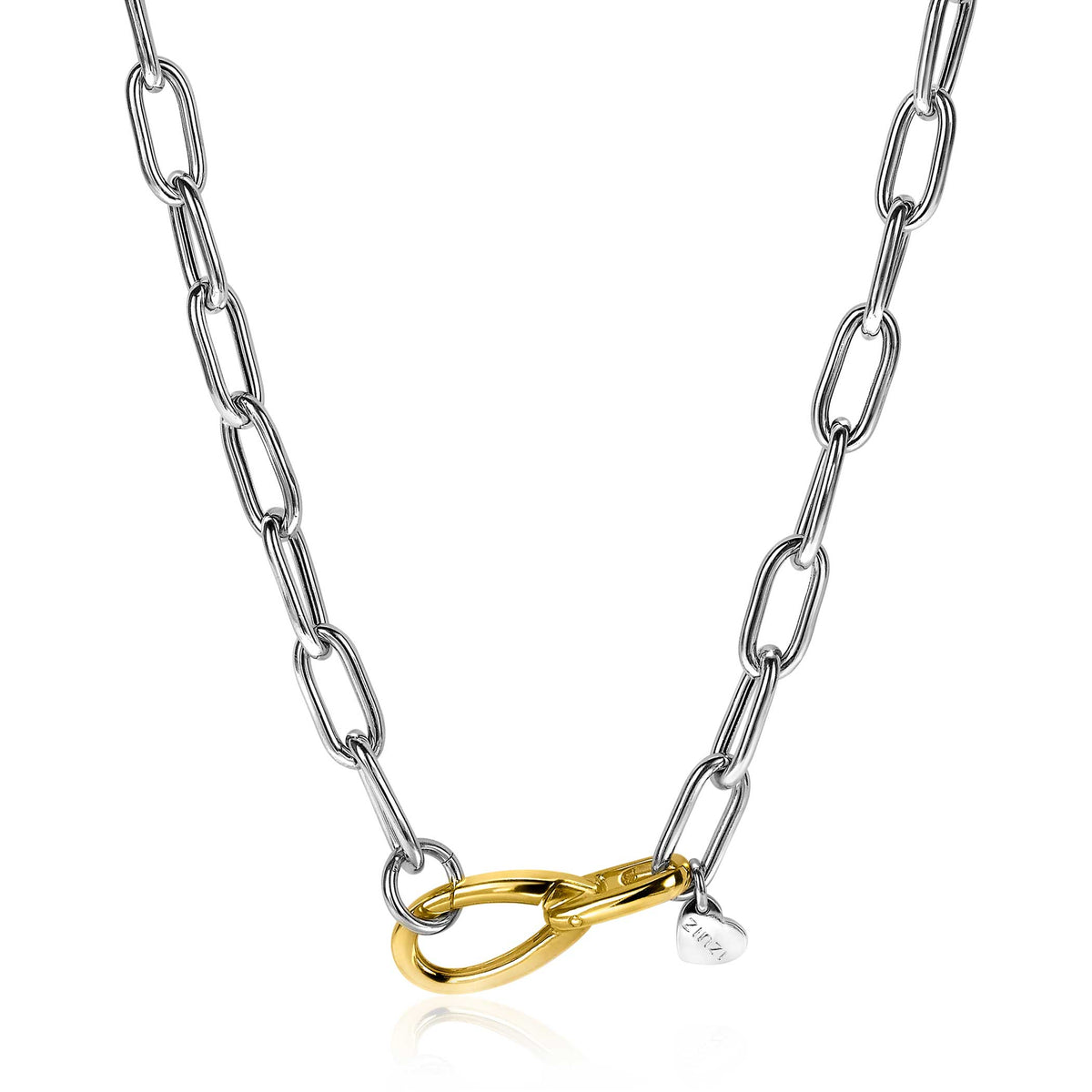 Cadena de plata con eslabones y detalle en oro, con un charm brillante.