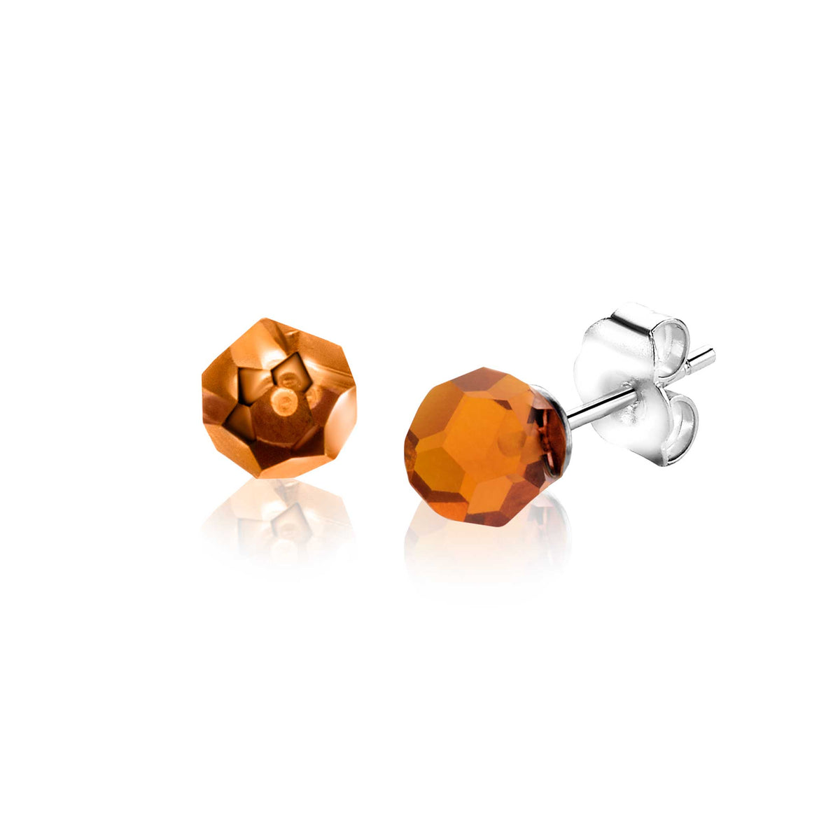 Pendientes de cristal facetado en color ámbar con base de plata.