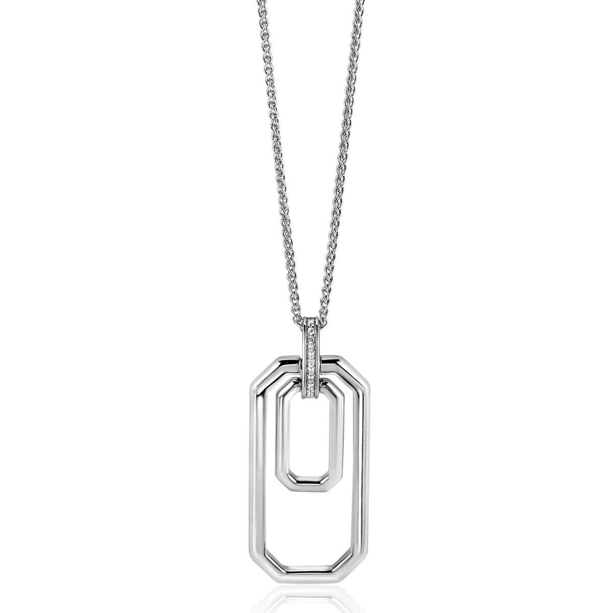 Collar de plata con colgante en forma de dos óvalos entrelazados.