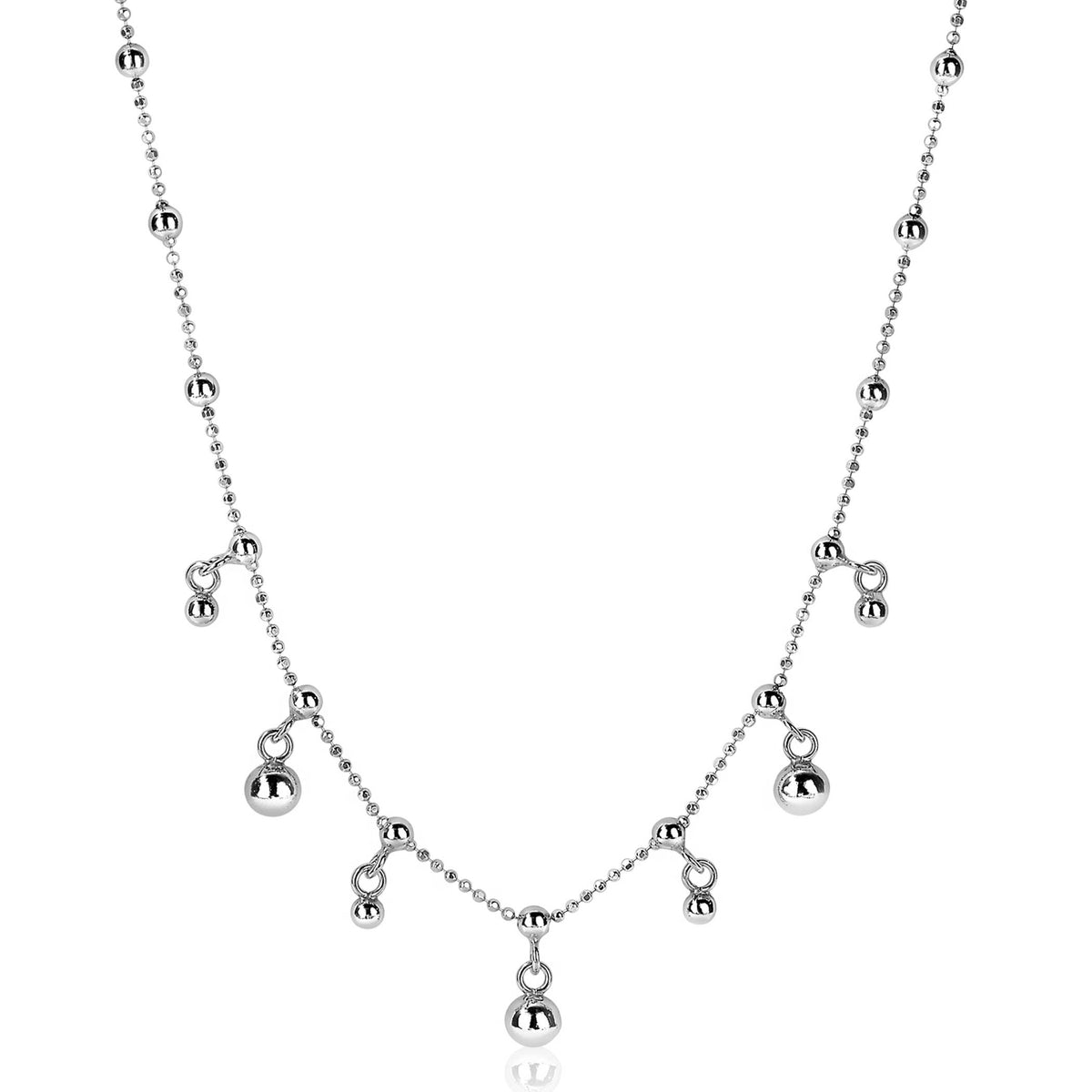 Collar de plata con esferas brillantes y detalles colgantes en forma de gotas.