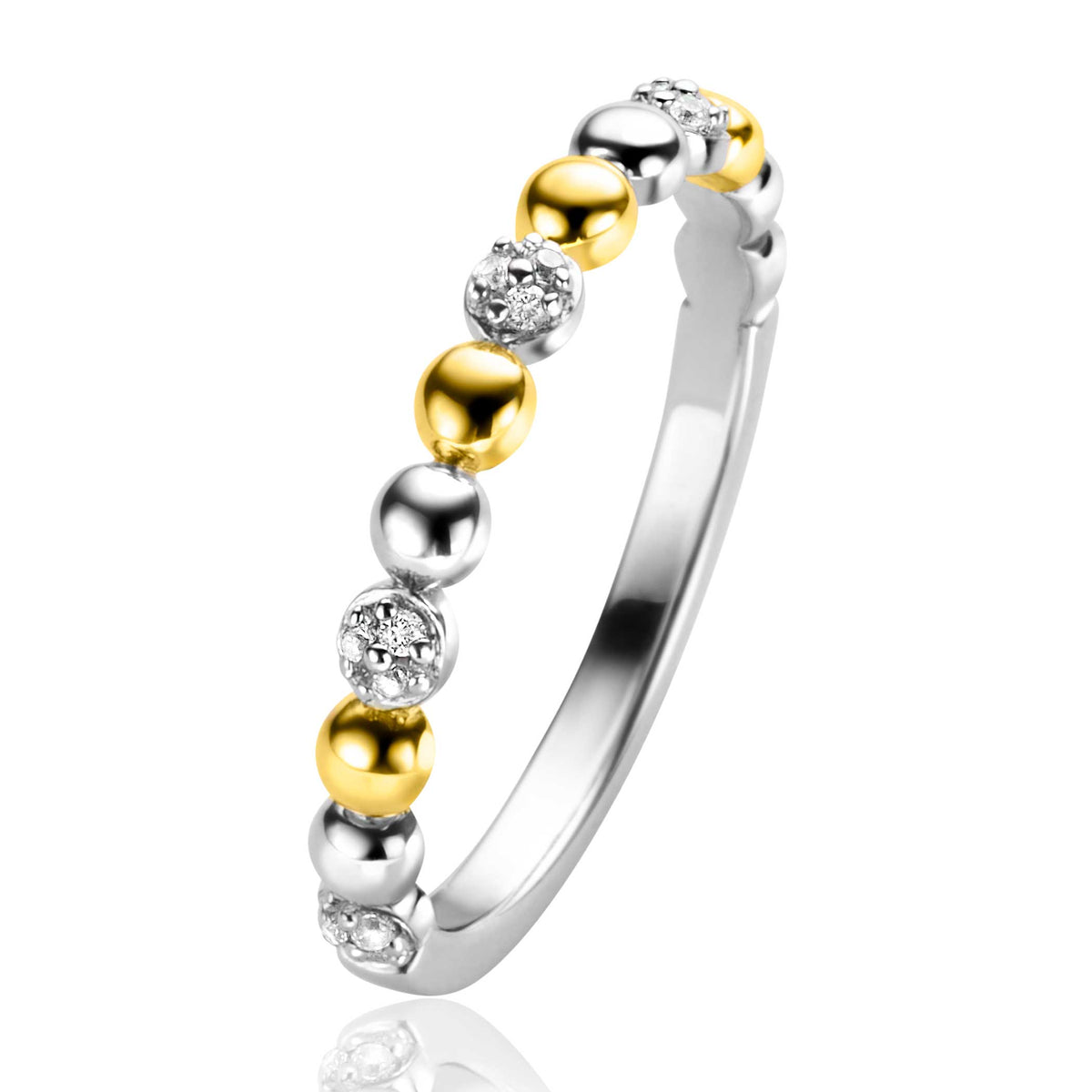 Anillo de plata con esferas doradas y detalles en circonitas.