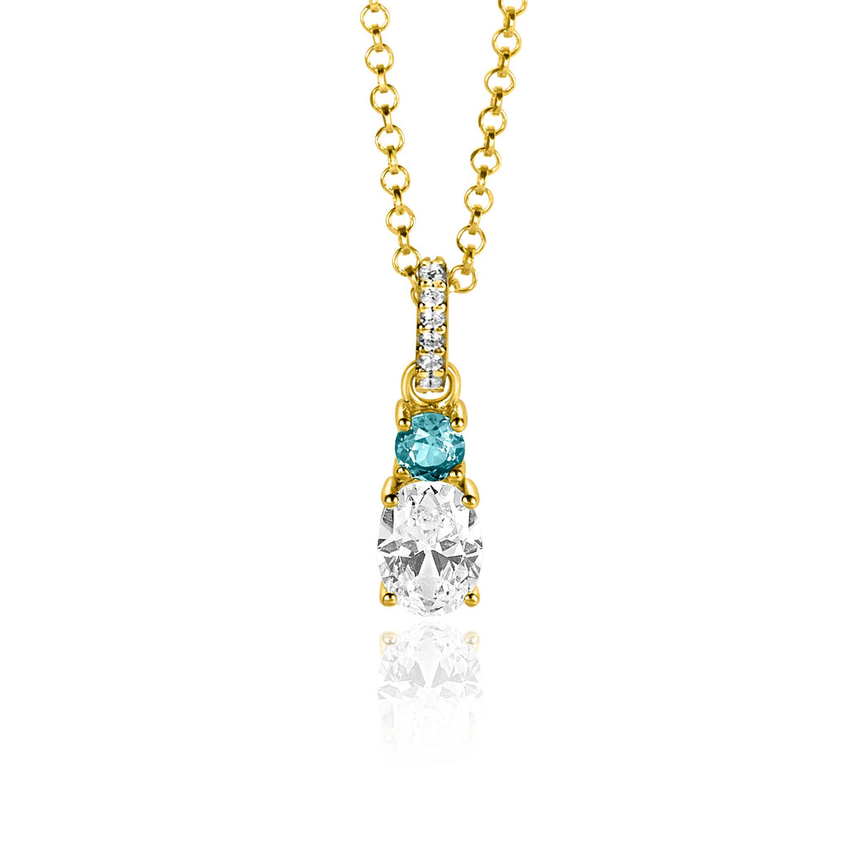 Colgante dorado con piedra transparente y piedra azul, adornado con pequeños cristales.