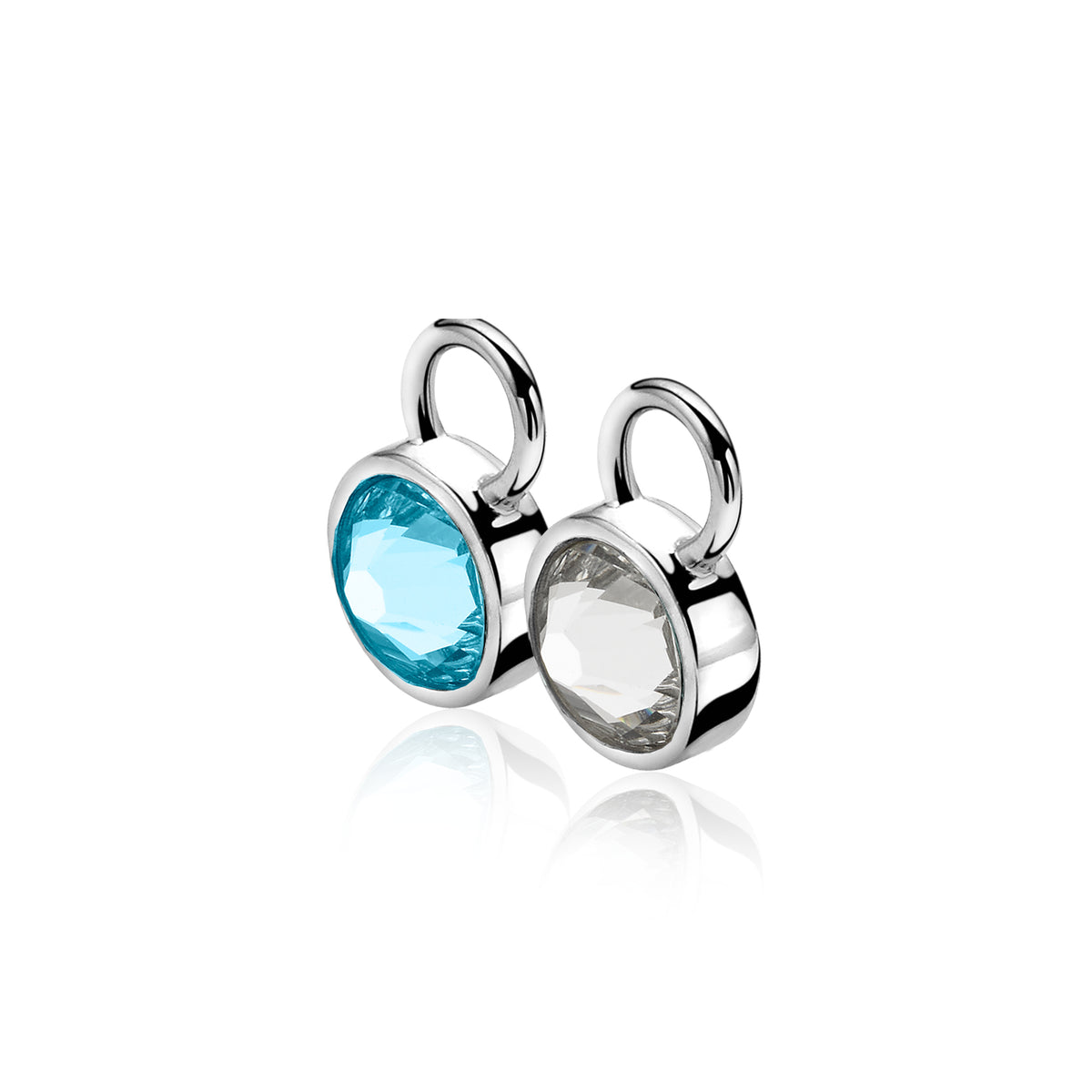 Pendientes de plata con piedras preciosas en tonos azul y transparente.