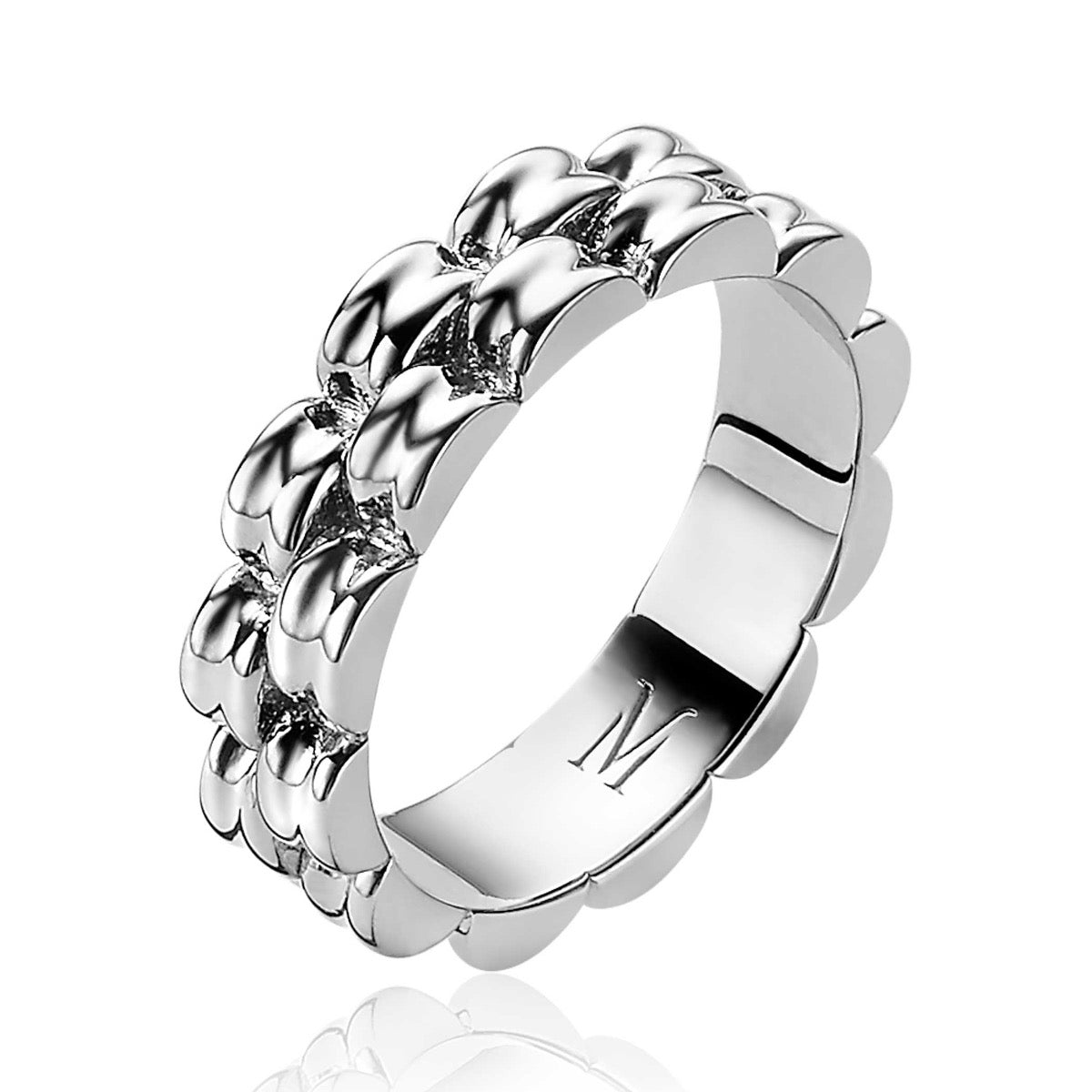 Anillo de plata con diseño ondulado y detalles brillantes.