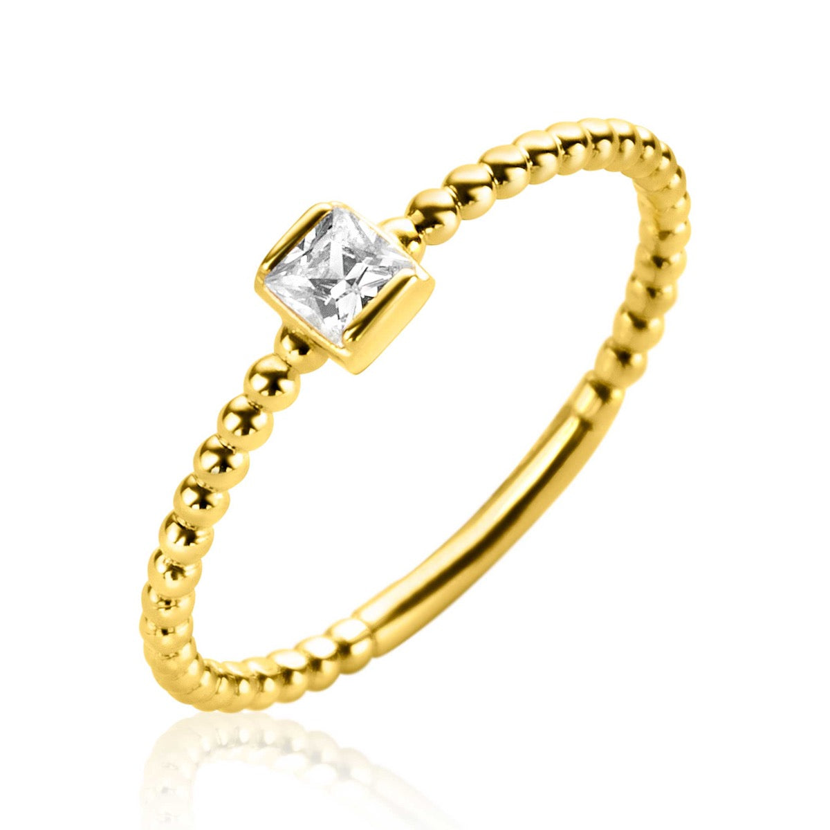 Anillo dorado con un diseño de cuentas y una piedra cuadrada brillante en el centro.
