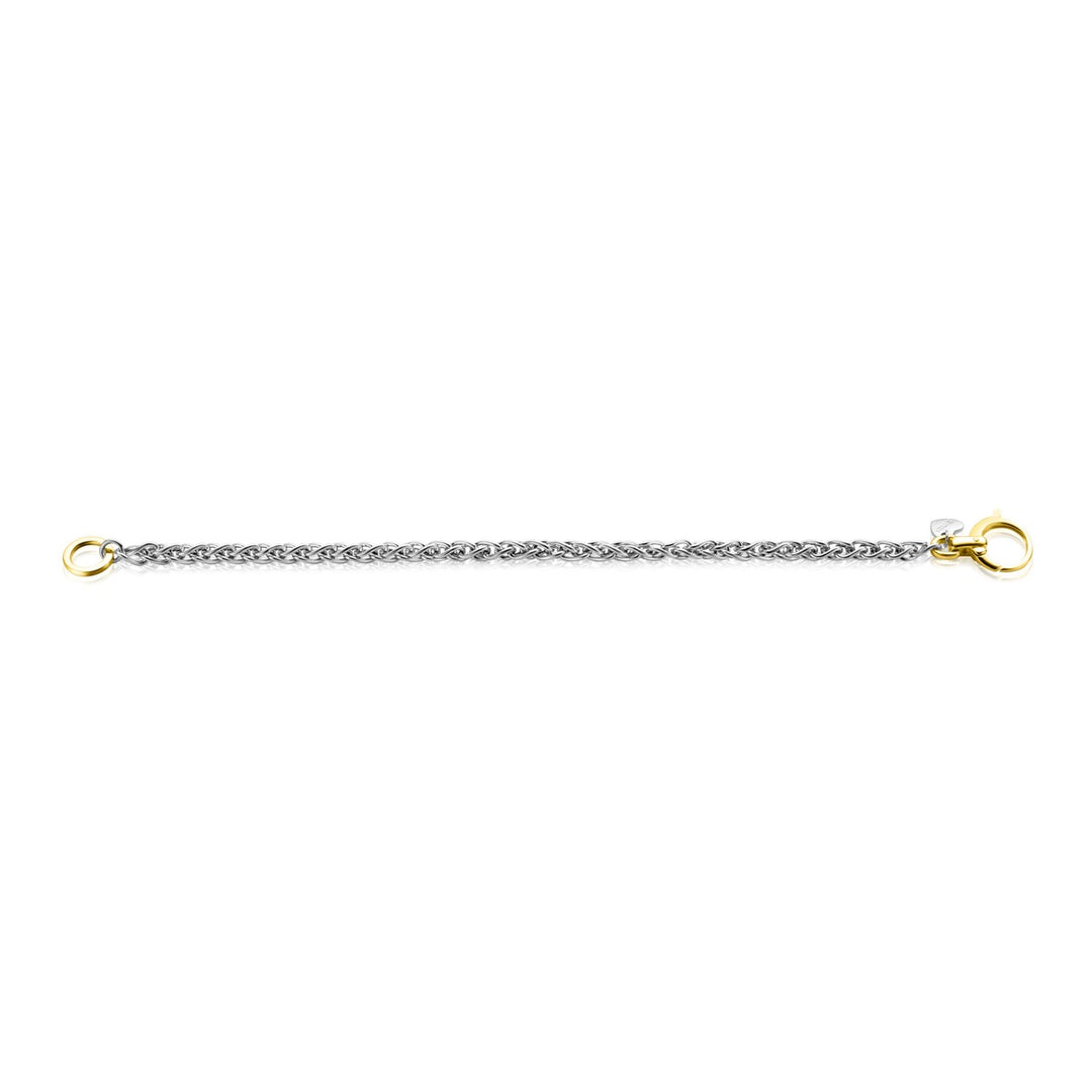 De Zinzi Armband Zilver Zia2369 is een delicate zilveren armband met ingewikkeld geweven schakels en een vergulde ronde siersluiting. Met een karabijnsluiting en gouden lussen aan elk uiteinde, is het eenvoudige en elegante ontwerp perfect voor dagelijks gebruik.