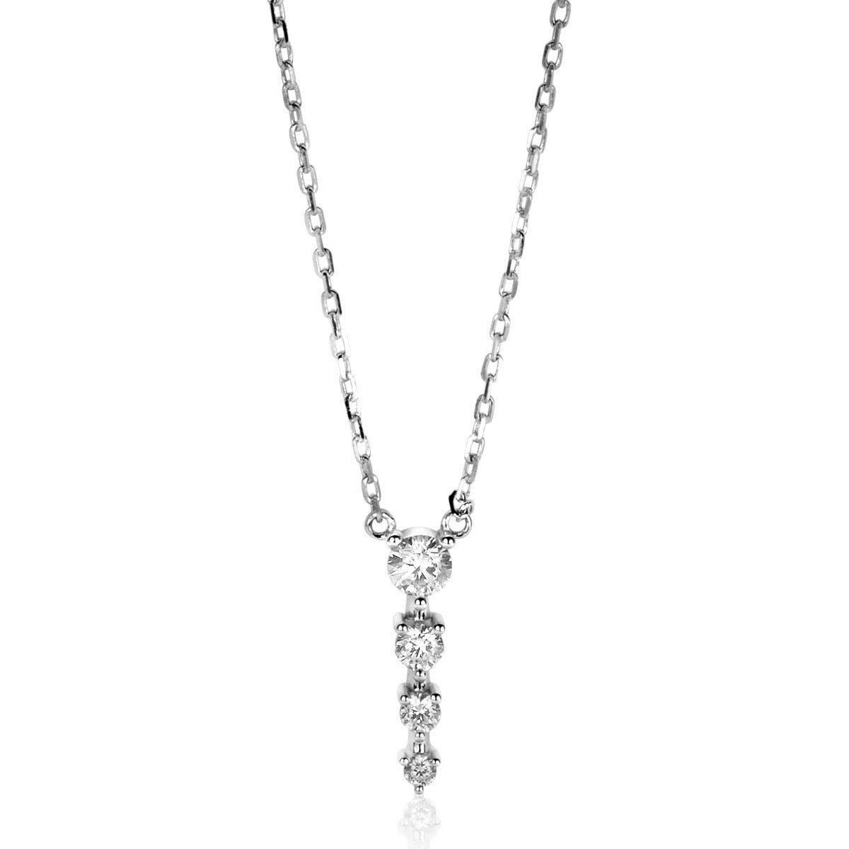Collar de plata con colgante en forma de gota, adornado con piedras brillantes.