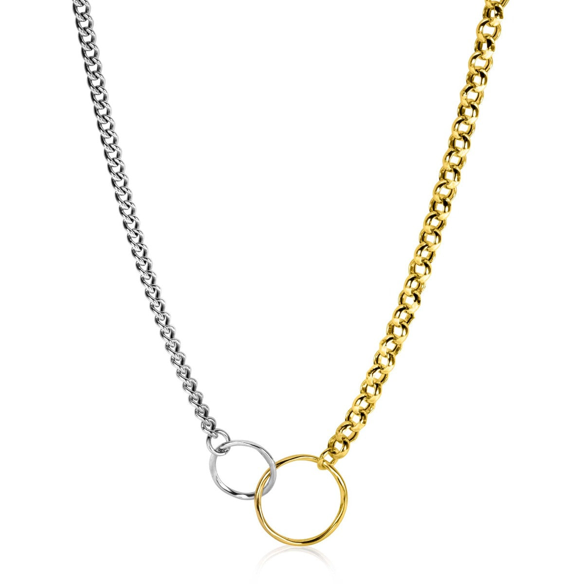 Cadena de eslabones en plata y oro con un colgante circular.